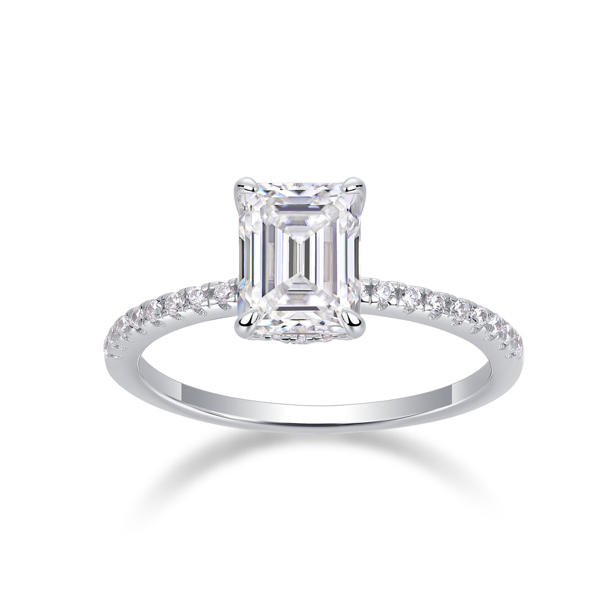 CARISSIE emerald cut ring front view, displaying step facets of center stone and four-prong cathedral setting