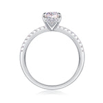 CARISSIE pear moissanite solitaire ring top-down view, revealing inner band details and stone arrangement