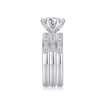 CARISSIE round moissanite solitaire ring set, vertical side profile illustrating the height of the center stone relative to bands