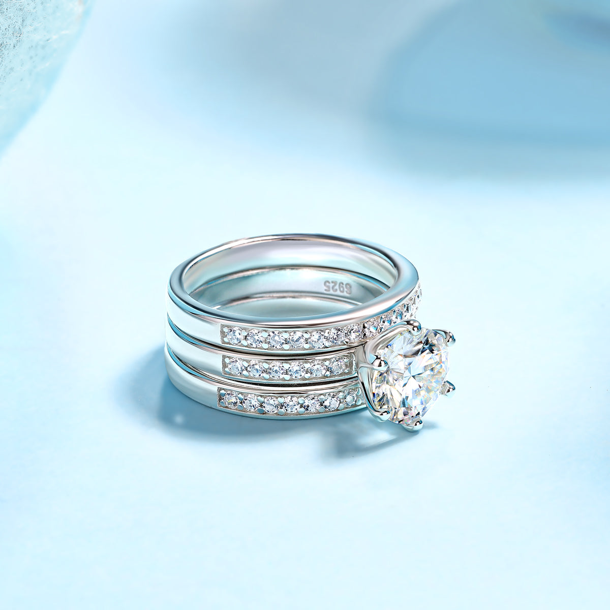CARISSIE round moissanite solitaire ring set, interior angle revealing S925 silver hallmark and smooth shank finish