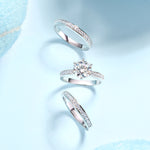 CARISSIE round moissanite solitaire ring set, floating product shot displaying separated center ring and two accent bands