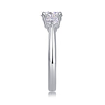 CARISSIE round moissanite solitaire ring, side profile emphasizing the height of the prong setting and sleek metal finish
