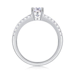 CARISSIE oval moissanite solitaire ring top-down view revealing inner gallery structure and round accent stones in silver metal