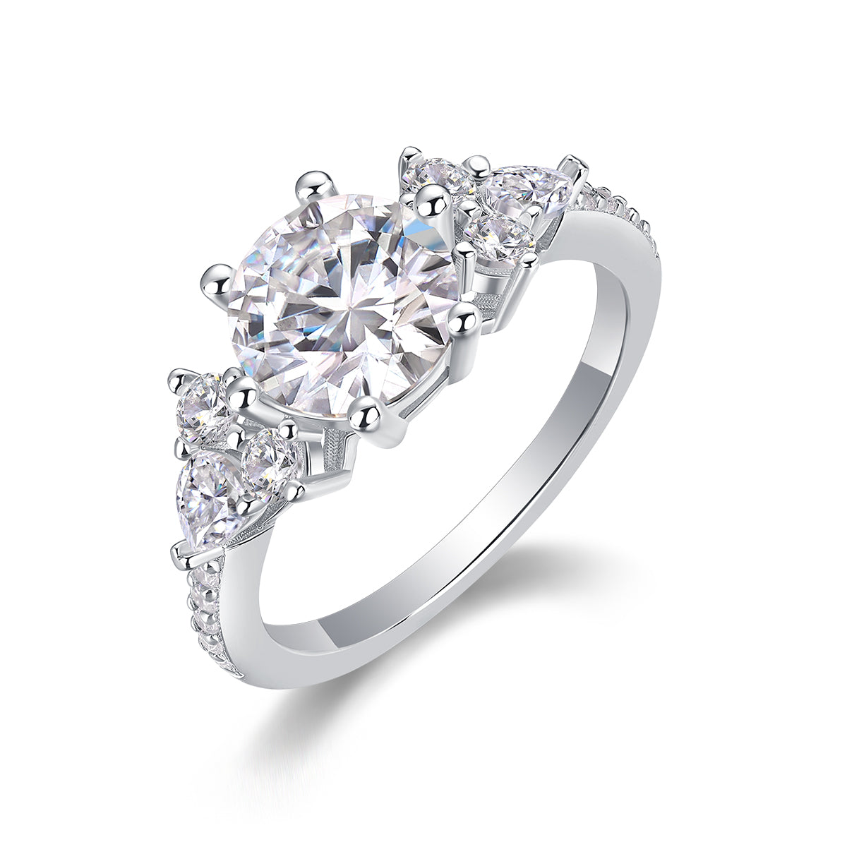 CARISSIE round moissanite solitaire ring angled studio shot, revealing pear accents and six-prong setting details