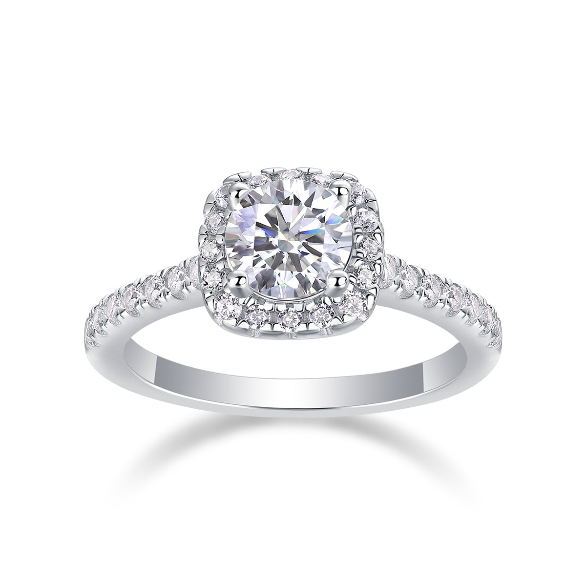CARISSIE round moissanite ring front studio shot, centered composition emphasizing symmetry and halo design