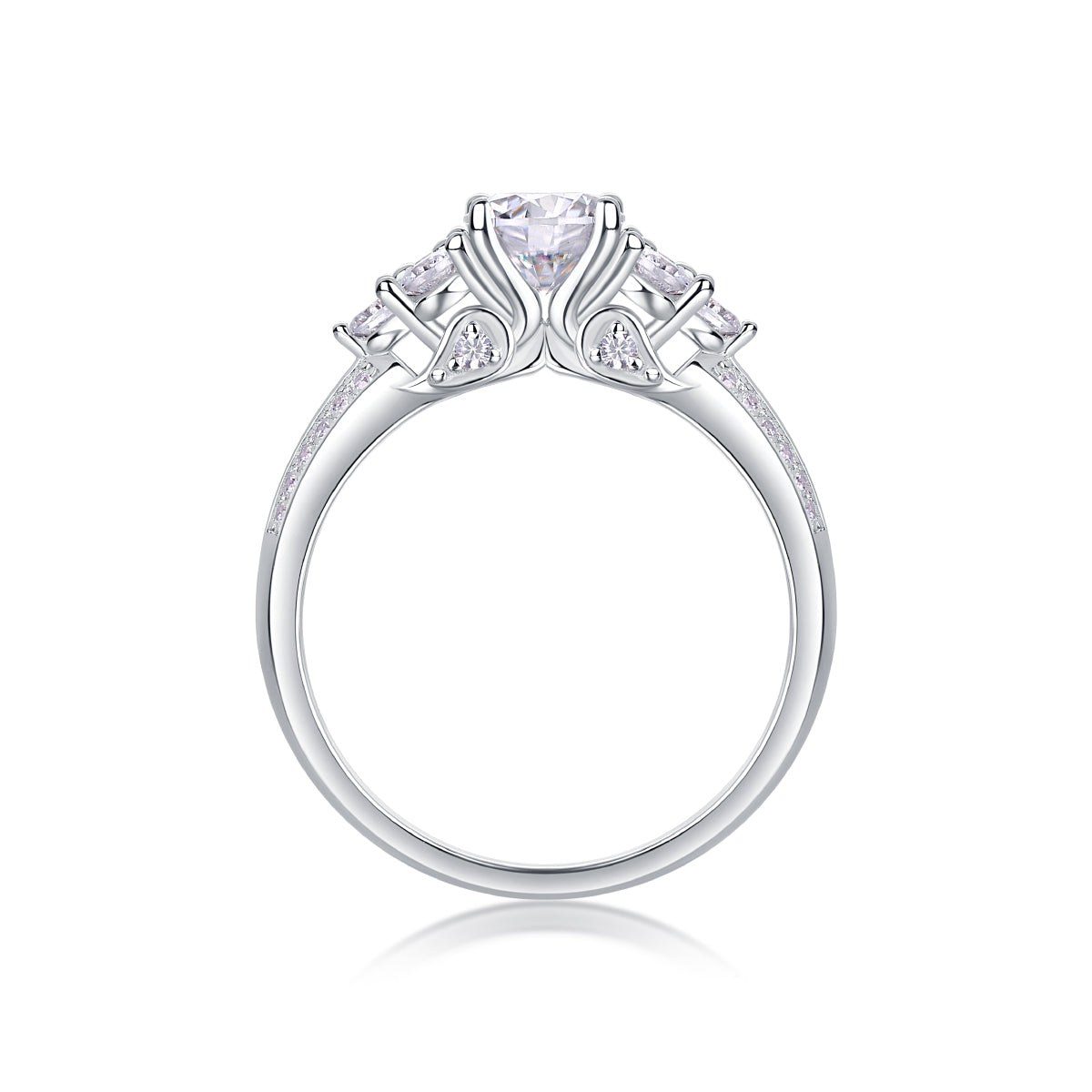 CARISSIE round moissanite solitaire ring, side profile revealing the elegant openwork gallery and prong setting structure