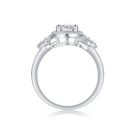 CARISSIE round moissanite solitaire ring, side profile showing prong setting height and pavé band stones