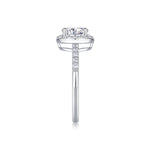 CARISSIE oval moissanite halo engagement ring vertical side view emphasizing pavé stones along the shank