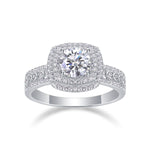 CARISSIE round moissanite halo engagement ring, front view highlighting cushion-shaped outer halo and pavé band