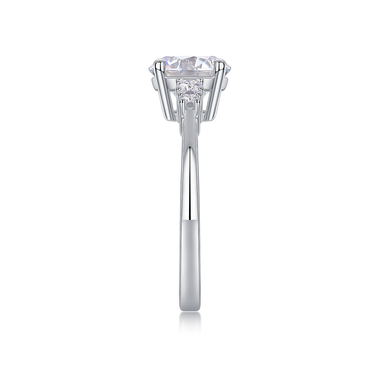CARISSIE round moissanite engagement ring, side profile revealing the tapered metal shank and vertical alignment of accent stones