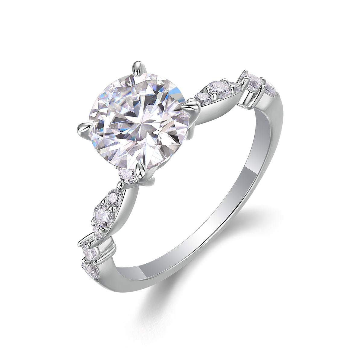 CARISSIE round moissanite solitaire ring, angled view highlighting brilliant center stone and marquise shoulder accents