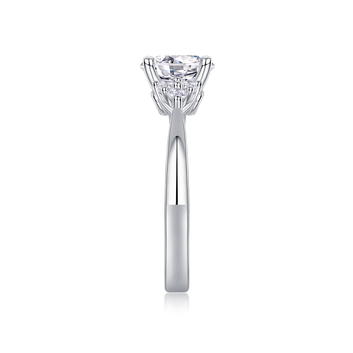 CARISSIE round moissanite solitaire ring, top-down side angle displaying vertical prong height and shoulder stone arrangement