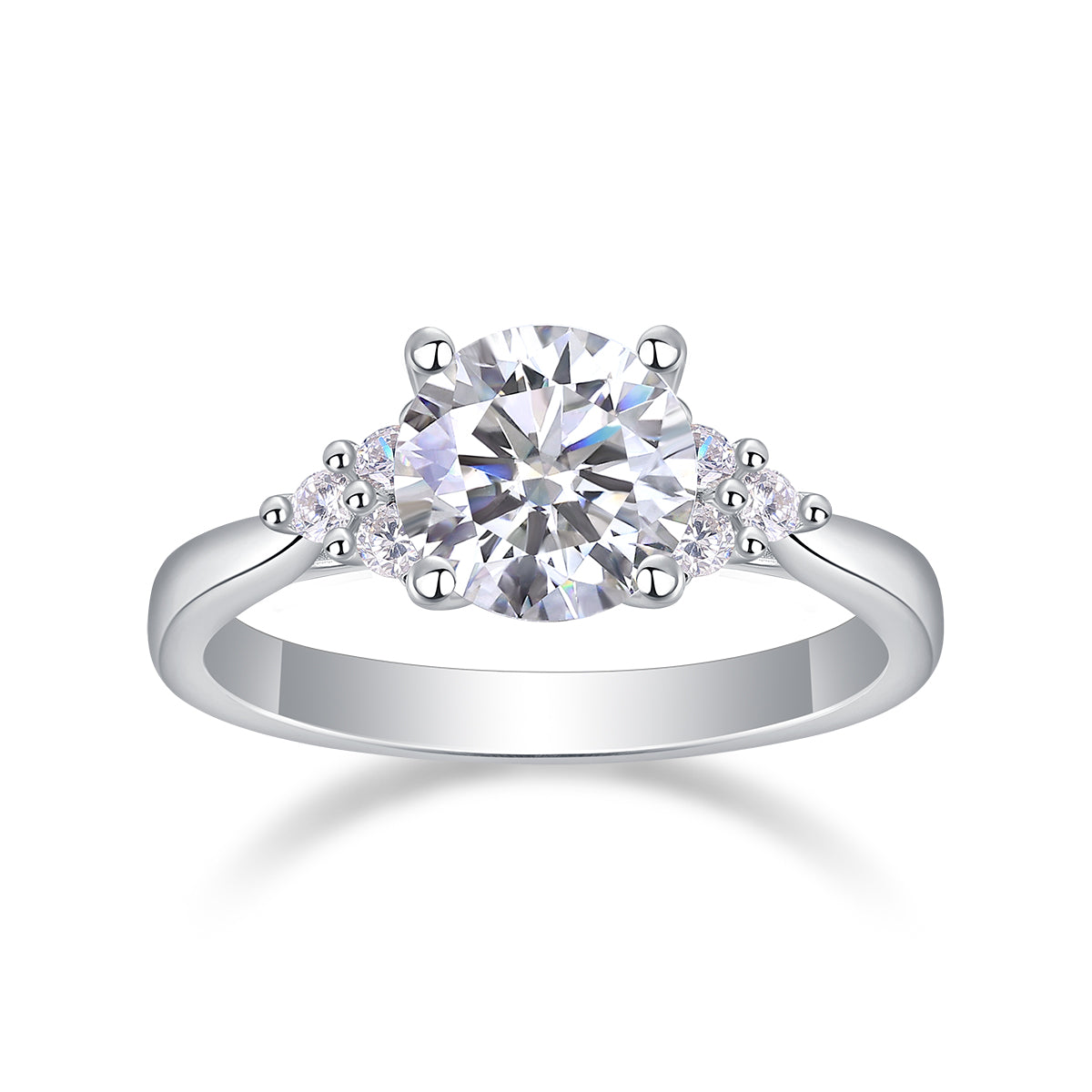 CARISSIE round moissanite solitaire ring, front view highlighting brilliant center stone and symmetrical side accents in polished metal