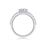 CARISSIE round moissanite solitaire ring, top-down view highlighting the circular shank and bead-set stones on shoulders