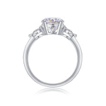 CARISSIE round moissanite solitaire ring, side profile revealing high-set gallery and structural details of the prongs