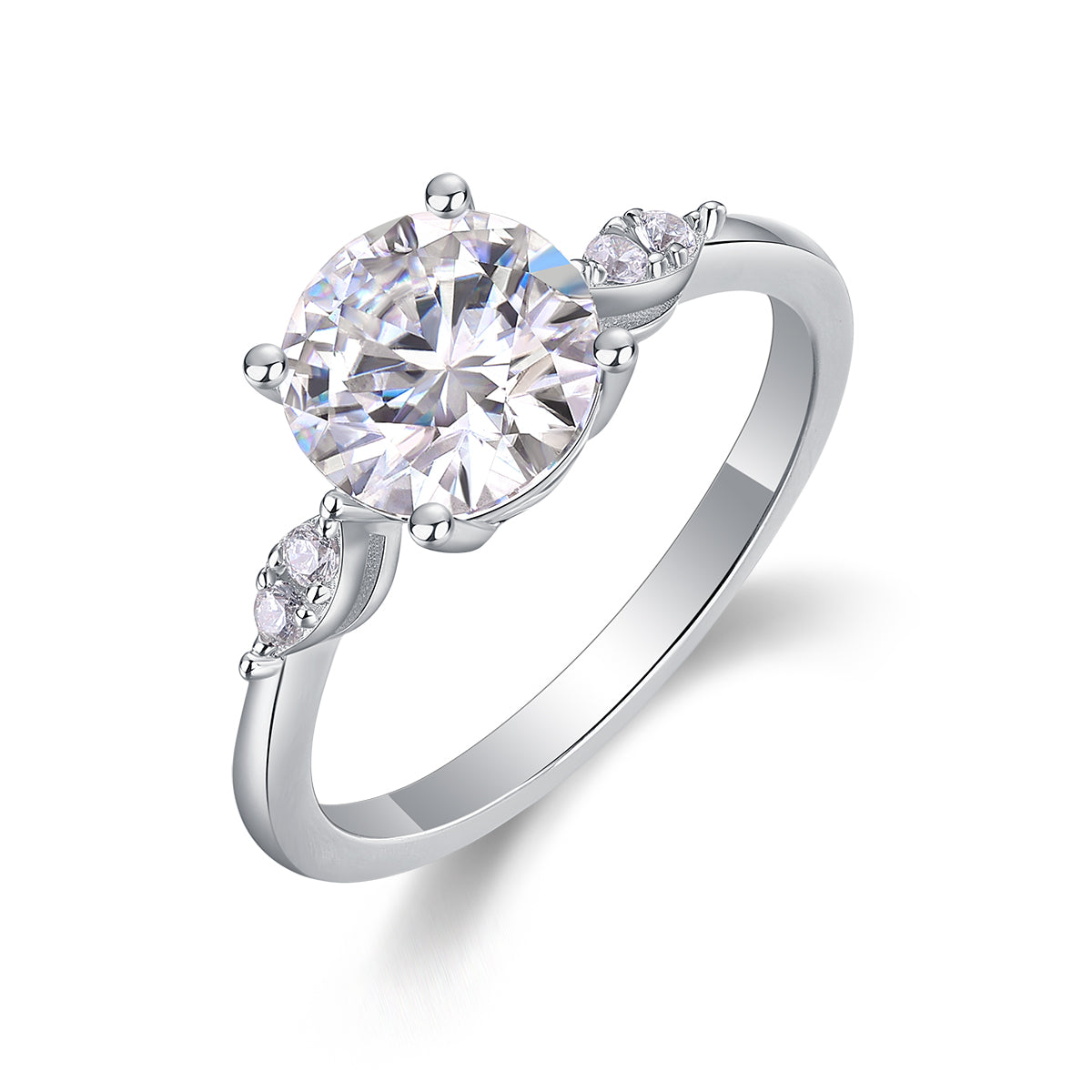 CARISSIE round moissanite solitaire ring, angled view showing split shank shoulders with accent stones and polished silver band
