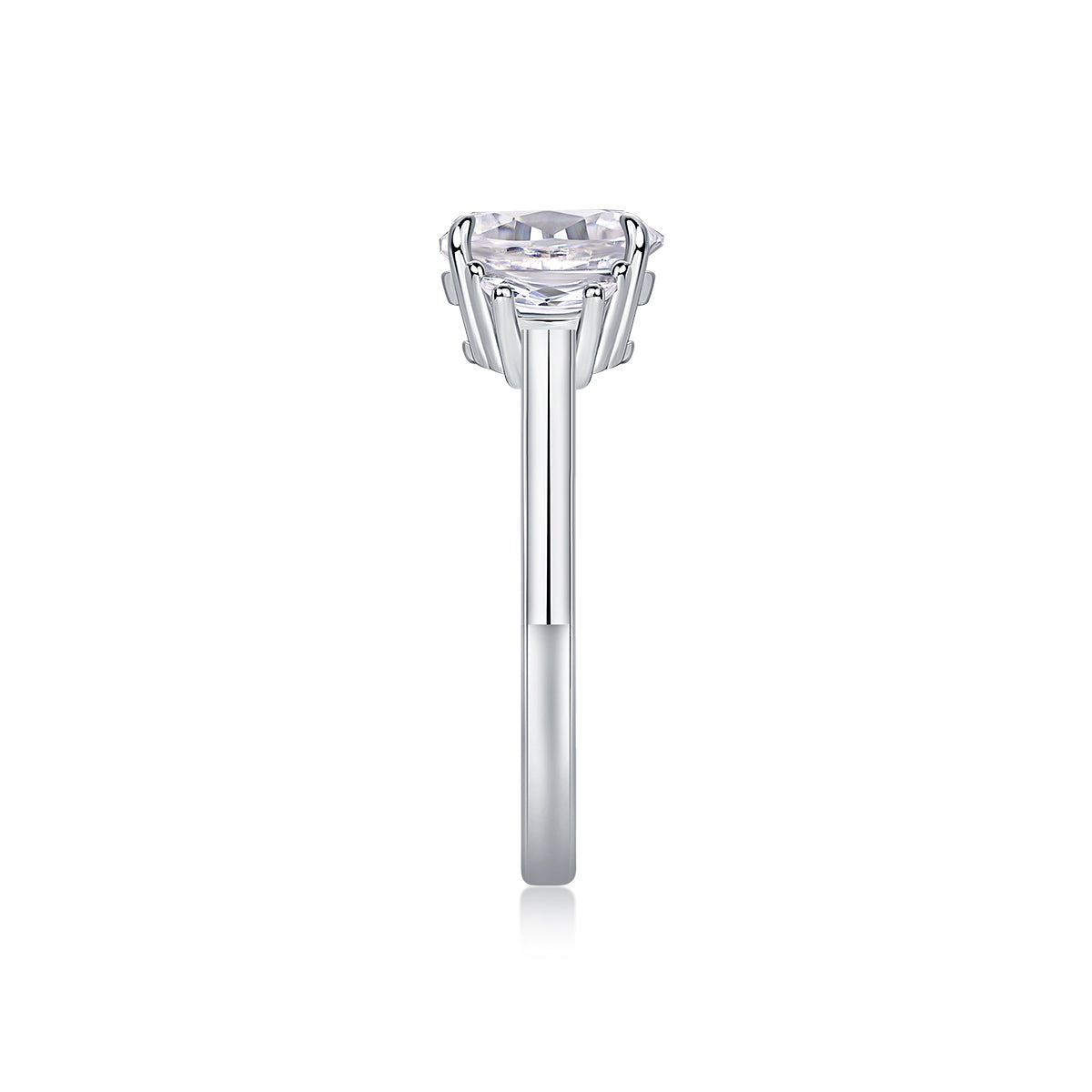 CARISSIE oval moissanite solitaire ring, straight side profile revealing the slender shank and elevation of the prong setting