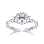 CARISSIE oval moissanite solitaire ring, direct front view displaying the three-stone arrangement and polished silver-tone band