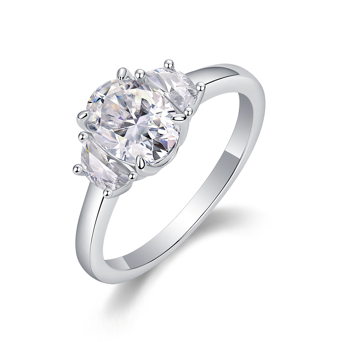 CARISSIE oval moissanite solitaire ring, angled view highlighting the brilliant center stone and side stones in a prong setting