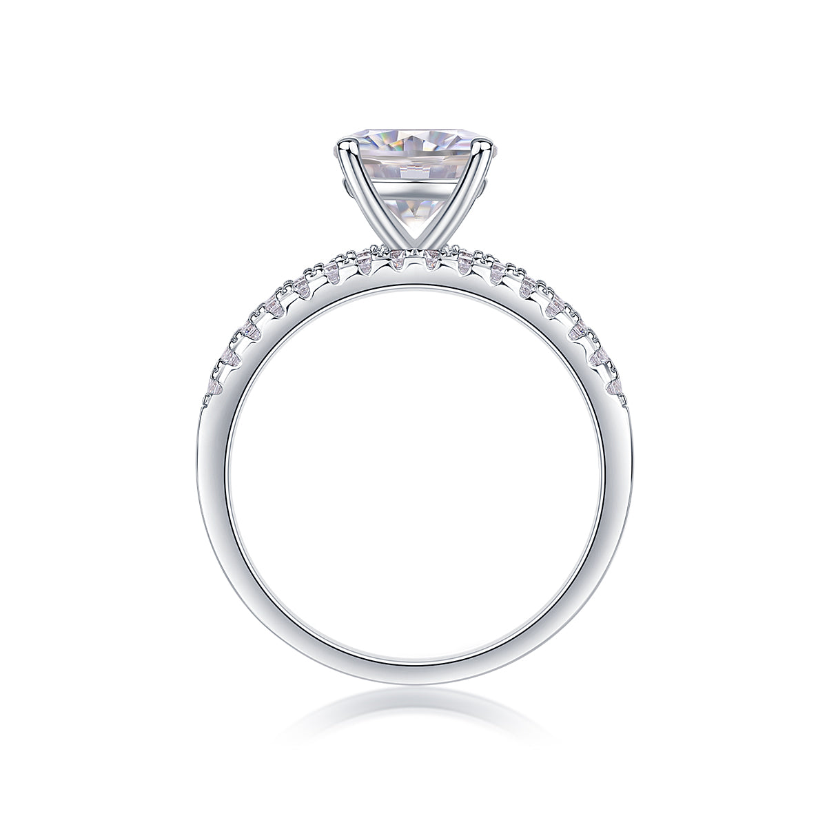 CARISSIE round moissanite solitaire ring, side profile view revealing the prong setting height and pavé stones along the band curve