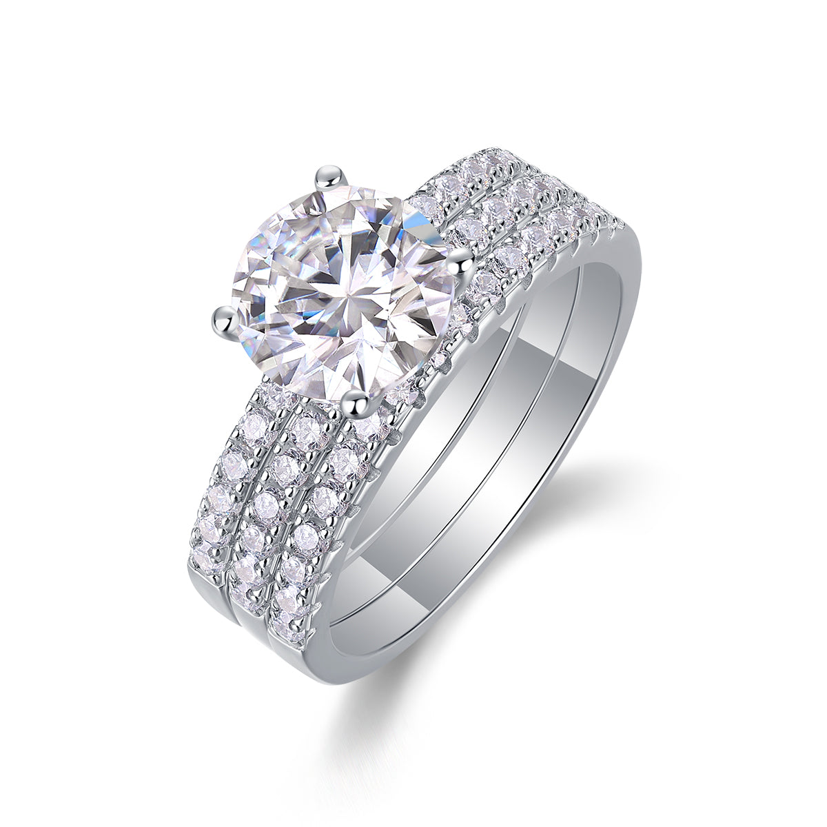 CARISSIE round moissanite solitaire ring set, angled view showing the large center stone and double pavé bands in silver-tone metal