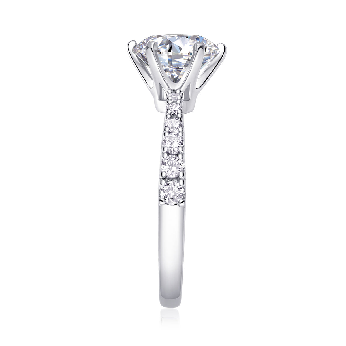 CARISSIE round moissanite solitaire ring, side view emphasizing the gallery rail and graduated pave accents on shank
