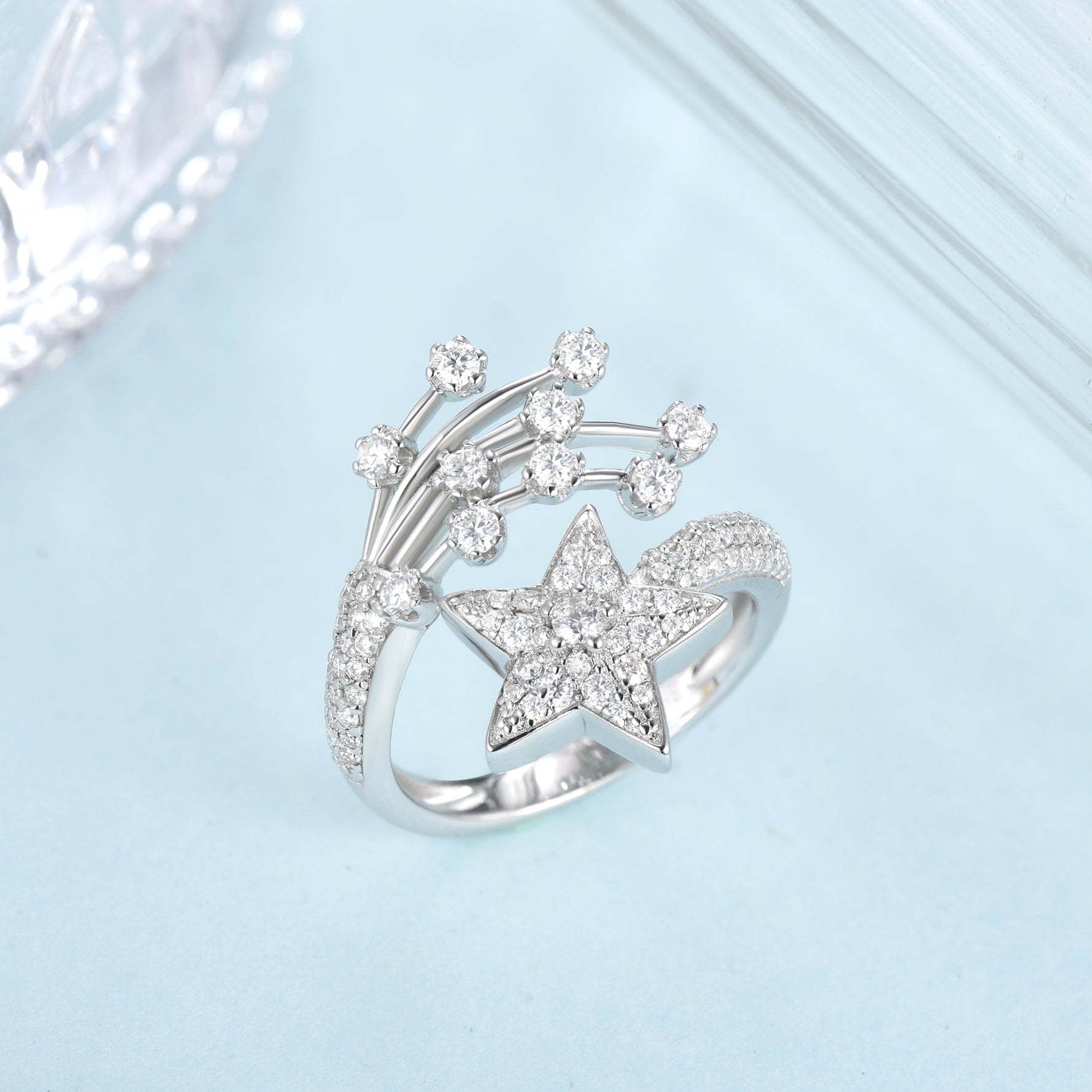 CARISSIE round moissanite cluster engagement ring, top-down perspective displaying the open split-shank design details