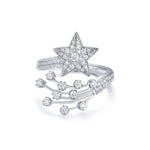 CARISSIE round moissanite cluster engagement ring, front view on white background showcasing the celestial diamond trail