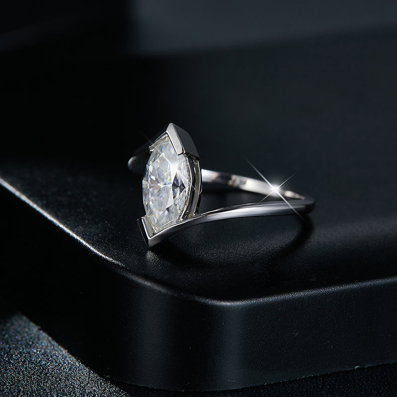 CARISSIE 5x10mm marquise ring, close-up lifestyle shot resting on a box to showcase depth and brilliance