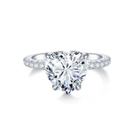 CARISSIE heart solitaire engagement ring, direct front view on white background emphasizing the symmetrical heart shape