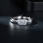 CARISSIE cushion moissanite bezel ring, dark lifestyle shot displaying intense brilliance and starburst sparkle effects