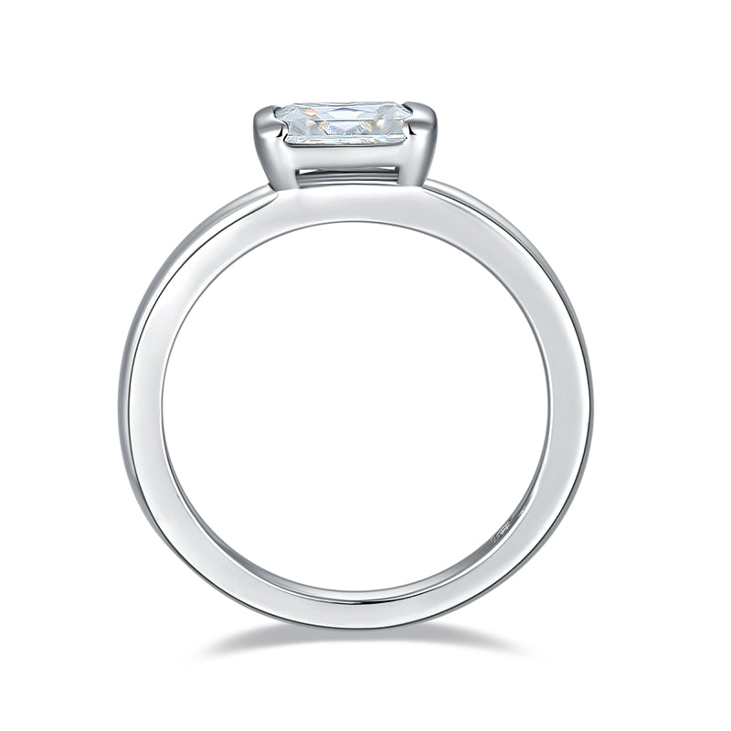 CARISSIE cushion moissanite bezel ring, side profile revealing low-profile design and continuous round shank shape