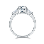CARISSIE engagement ring, top-down perspective focusing on the smooth inner shank and the gallery structure beneath the stones