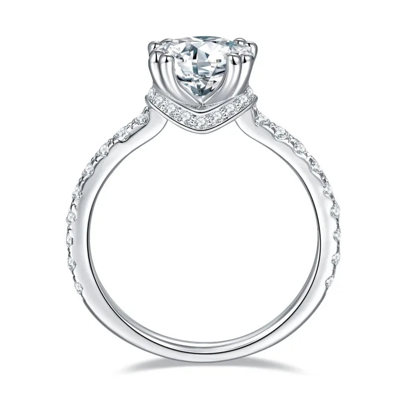 CARISSIE round moissanite solitaire ring, interior view of shank showing half-pavé stones extending along the band