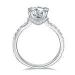 CARISSIE round moissanite solitaire ring, interior view of shank showing half-pavé stones extending along the band