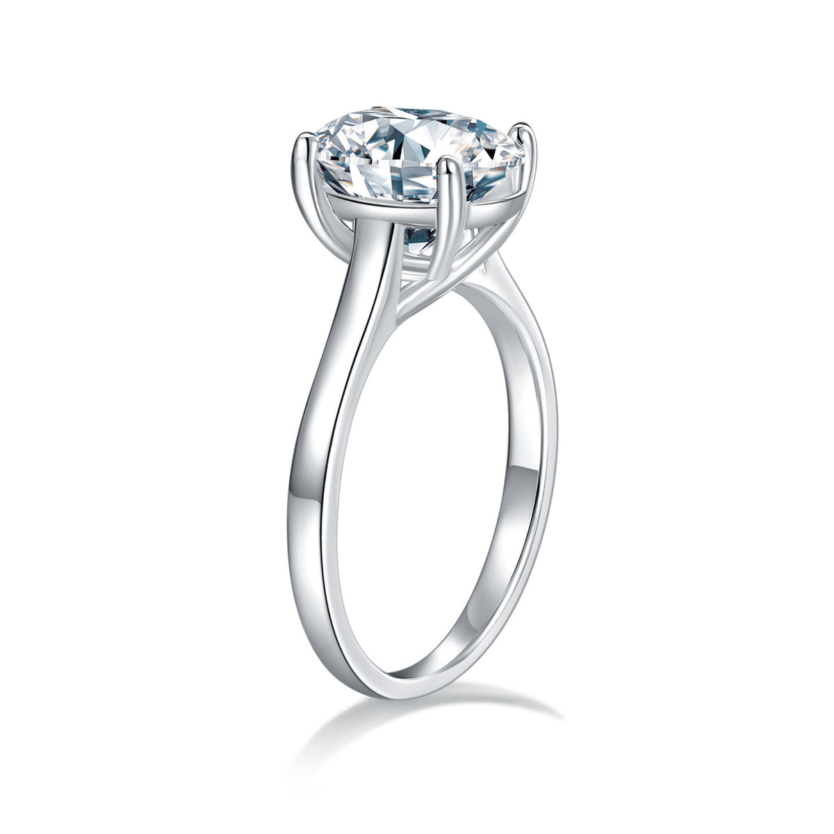 CARISSIE oval moissanite solitaire ring, side profile view revealing the elegant curve of the split shank and secure prongs