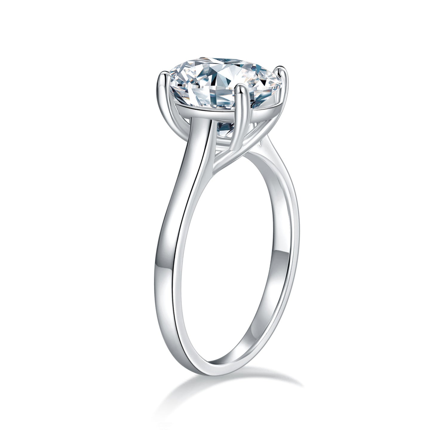 CARISSIE oval moissanite solitaire ring, side profile view revealing the elegant curve of the split shank and secure prongs