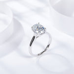 CARISSIE oval moissanite solitaire ring, diagonal perspective highlighting the high-profile setting and tapered shank design