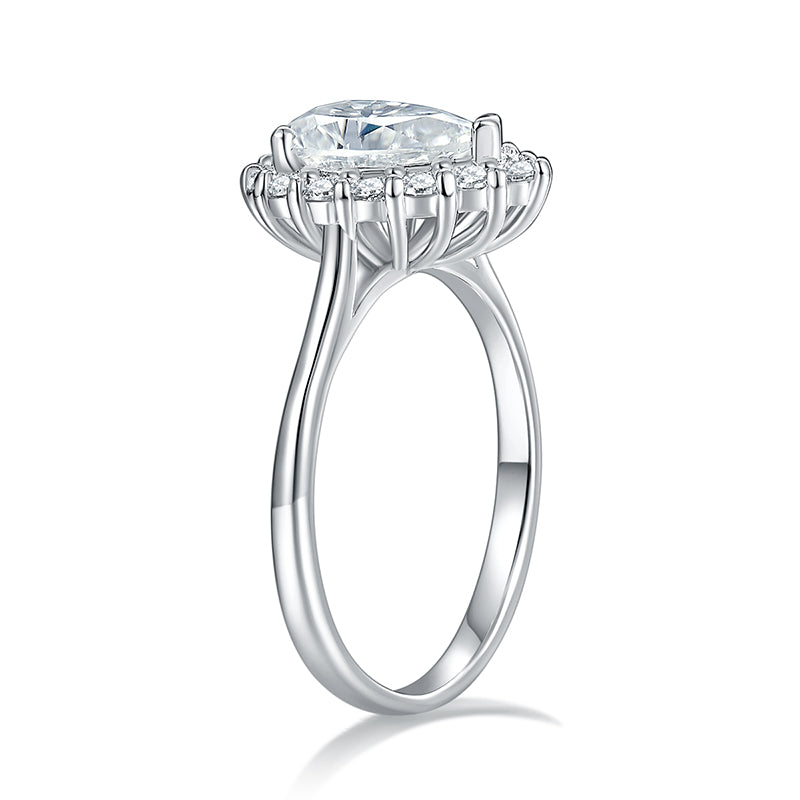 CARISSIE pear moissanite halo ring, side profile revealing the split shank design and intricate prong details supporting the head
