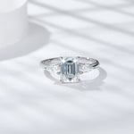 CARISSIE emerald cut solitaire ring, top-down view highlighting the large center stone and symmetrical setting