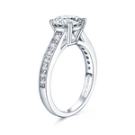 CARISSIE round moissanite solitaire ring, side profile highlighting the four-prong setting and inner S925 D2.00ct metal stamp