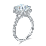 CARISSIE cushion moissanite halo engagement ring, side profile view emphasizing four-prong setting height and inner band smoothness