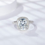 CARISSIE cushion moissanite halo engagement ring, front view displaying large center stone and double halo in silver-tone setting
