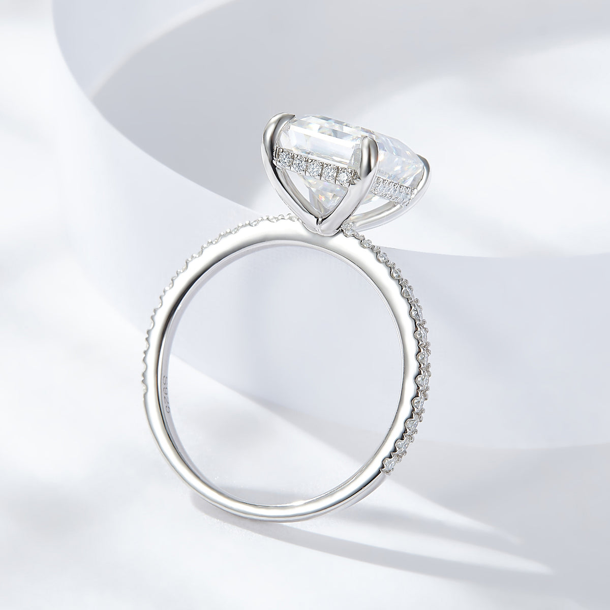 CARISSIE emerald cut solitaire engagement ring, bottom view revealing S925 stamp and inner band details