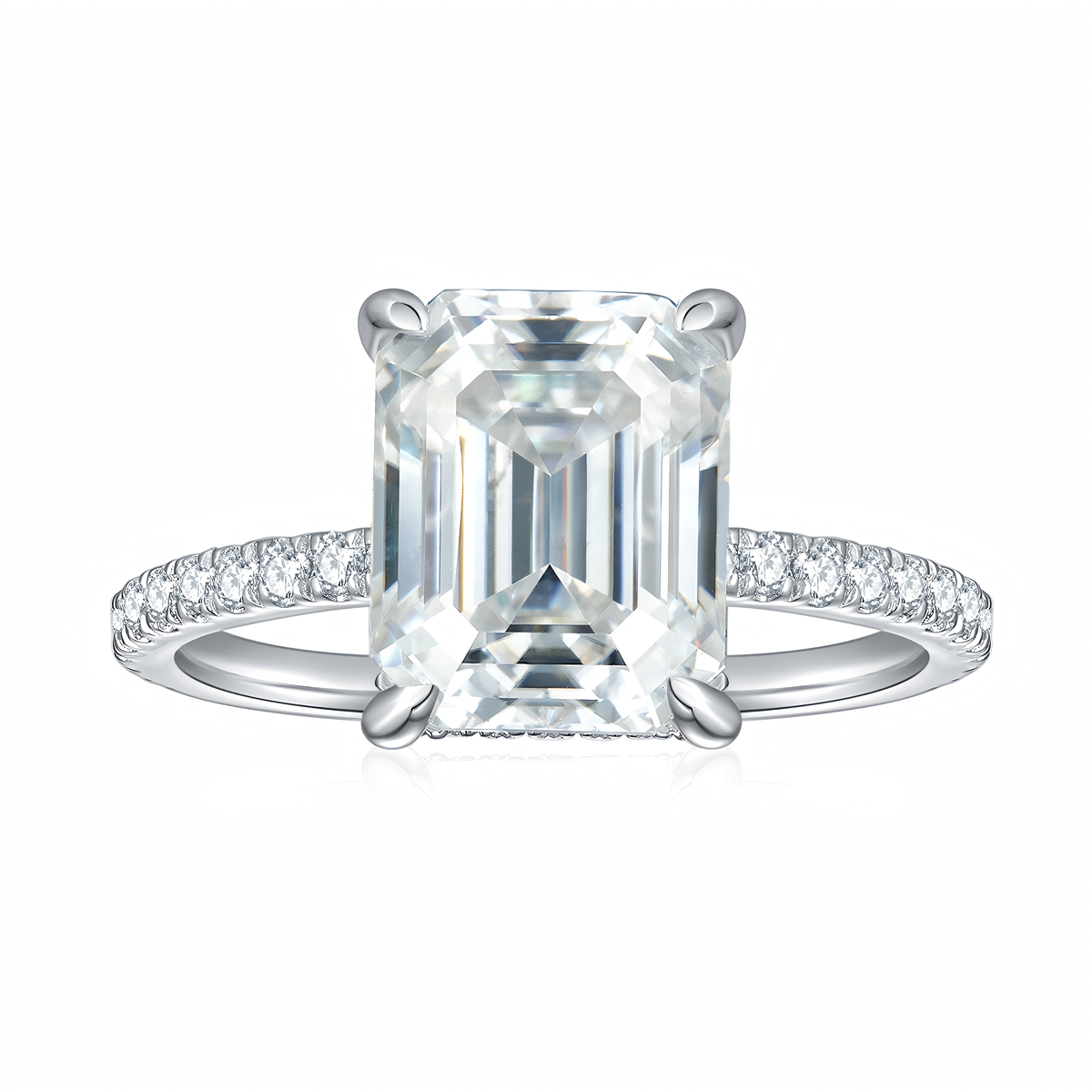 CARISSIE emerald cut solitaire engagement ring, studio shot emphasizing clarity of center stone against white background