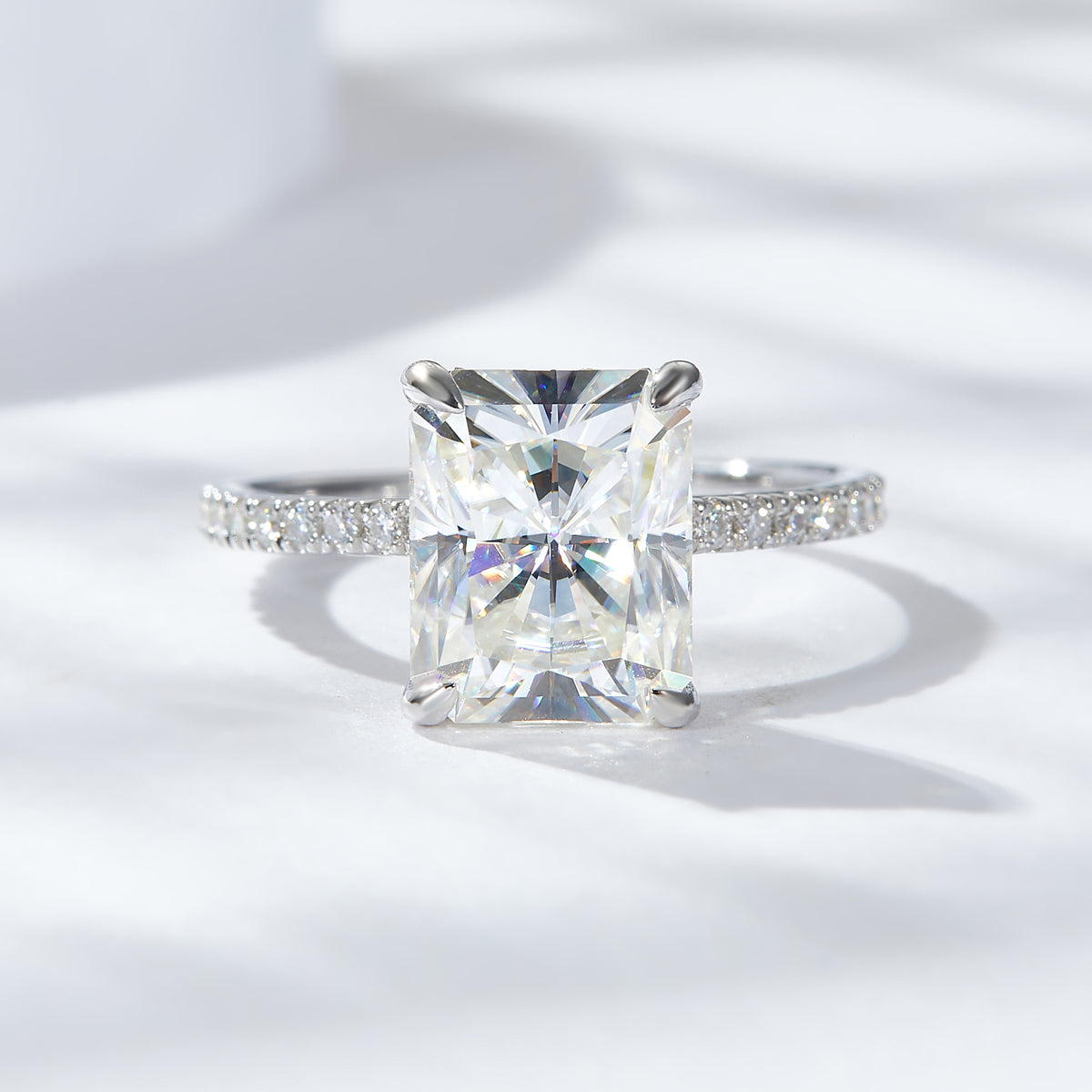 CARISSIE radiant solitaire engagement ring, direct front view showcasing the large rectangular center stone