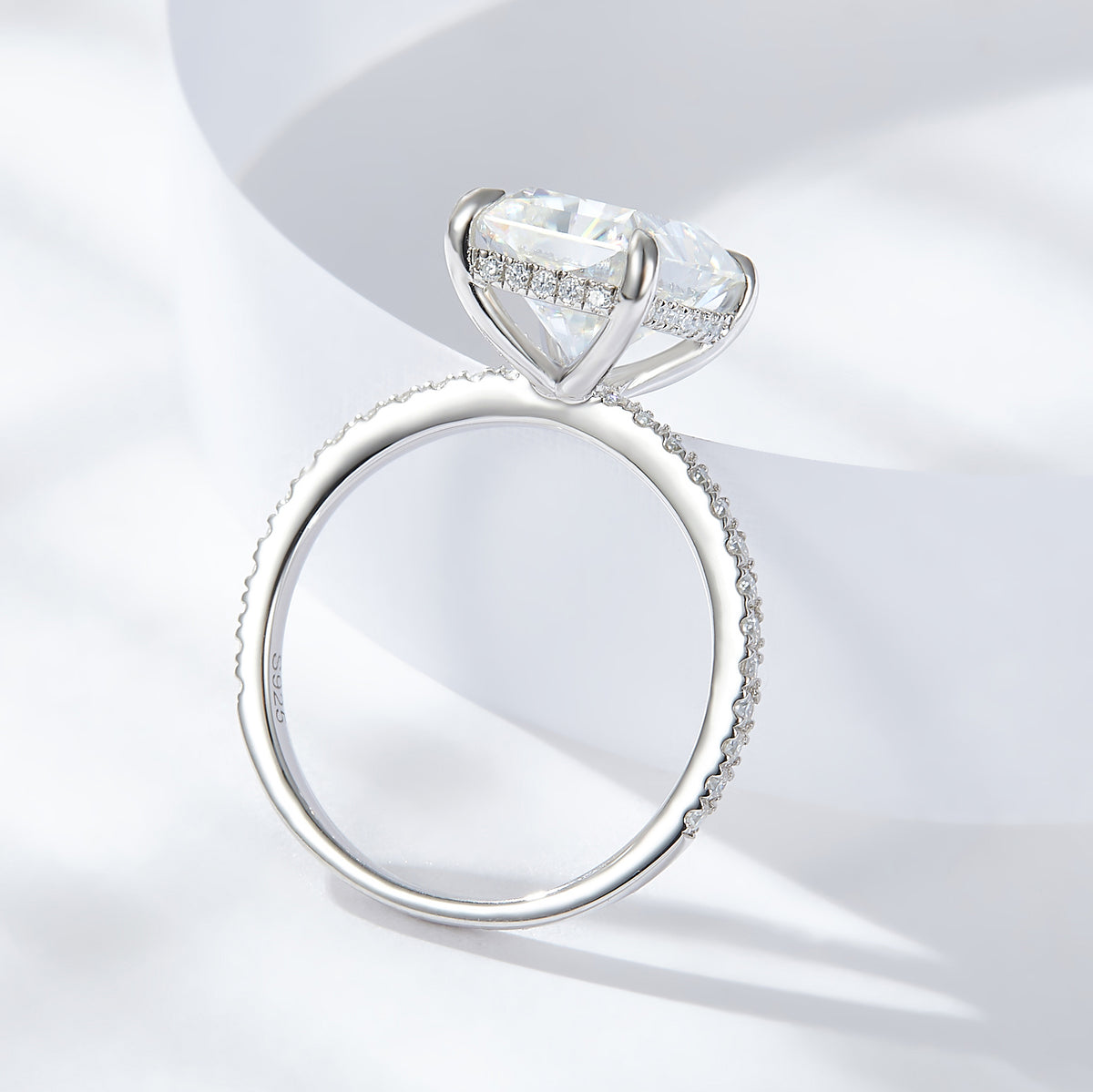 CARISSIE radiant solitaire engagement ring, side profile revealing the S925 stamp and half-pavé shank