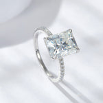 CARISSIE radiant solitaire engagement ring, high angle shot emphasizing the sparkle of the moissanite