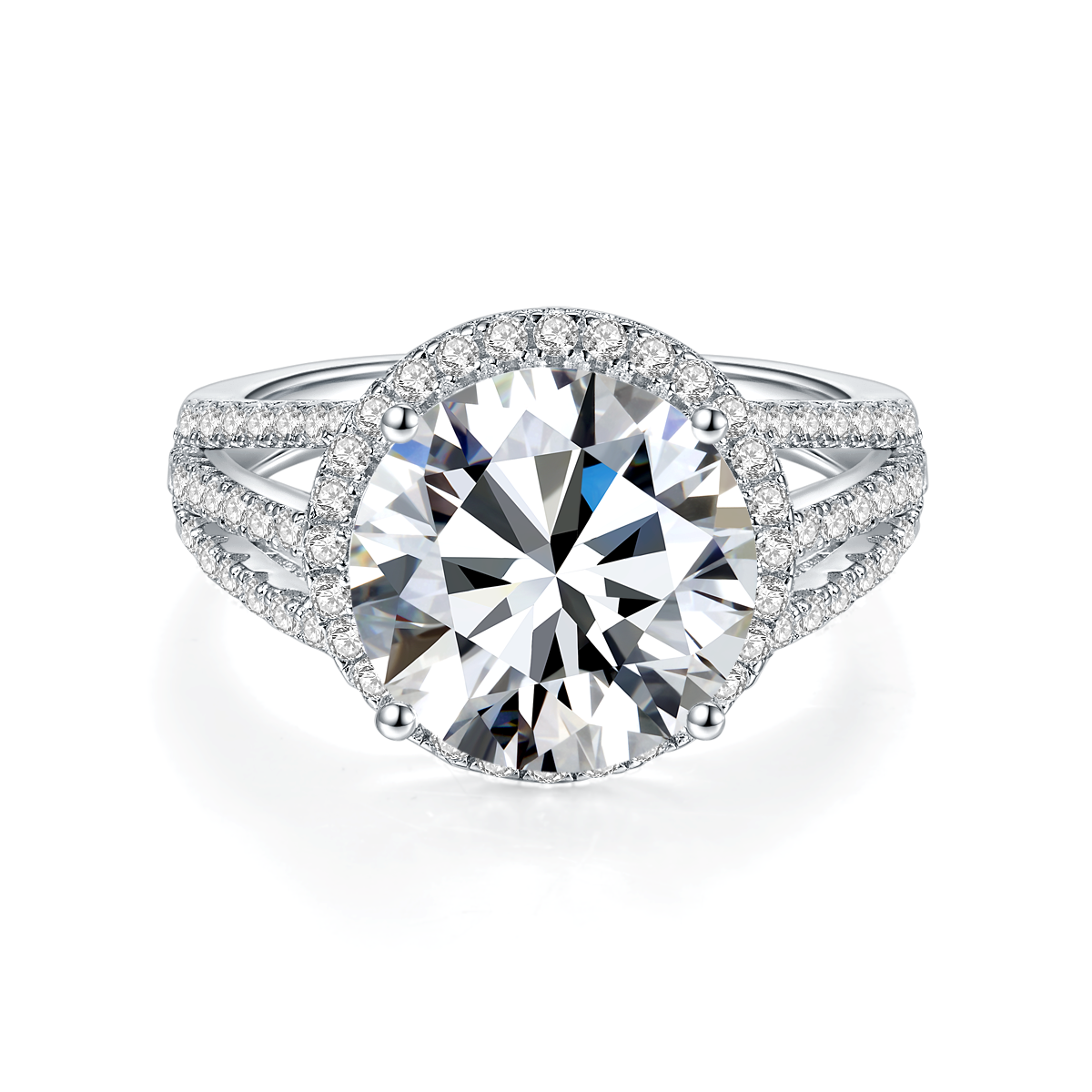 CARISSIE round moissanite solitaire ring, direct front close-up emphasizing prong details and continuous diamond halo