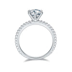 CARISSIE round moissanite solitaire ring, top-down perspective revealing the circular shape of the shank and accent stones